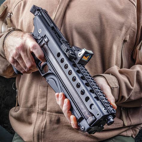 It has an ambidextrous safety, an ambi magazine release lever (we will go over that later), and a picatinny rail on top and bottom of the pistol. . Keltec p50 accessories